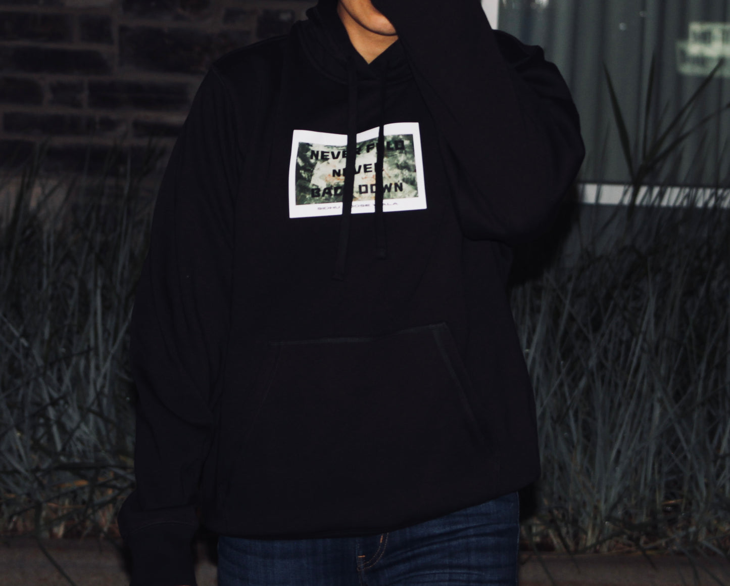 NEVER BACK DOWN UNISEX HOODIE